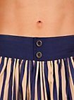 Pantaloni con balza a righe