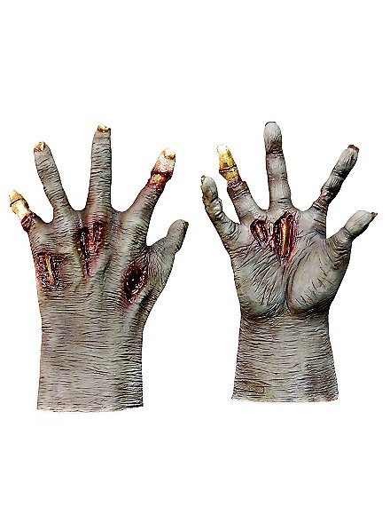 Mains de zombie foncées