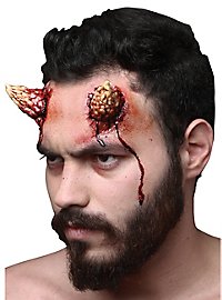 Pockede Djævlehorn Latex Applikation