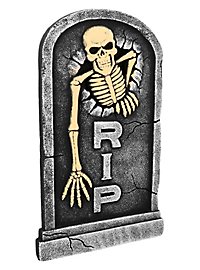RIP tombstone with skeleton