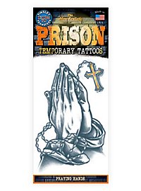 Tatouage adhésif mains en prière prison